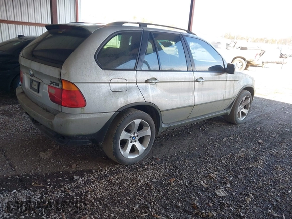 2001 BMW X5 3.0i with VIN WBAFA53591LH79412, listed as a IAAI auction lot 41410946 with 186,315 mi miles. Bid and sale history available at carsss.com. Image 4.
