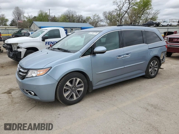 2014 Honda Odyssey Touring with VIN 5FNRL5H90EB007182, listed as a Copart auction lot 51152775 with 152,483 mi miles and Salvage title. Bid and sale history available at DreamBid. Image 1.