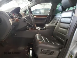 2007 Volkswagen Touareg V6 with VIN WVGZE77LX7D023186, listed as a Copart auction lot 71650314 with 99,577 mi miles and Clean Title. Bid and sale history available at DreamBid. Image 7.