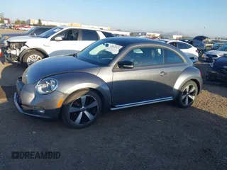 2012 Volkswagen Beetle 2.0T Turbo w/Sun/Snd/Nav PZEV with VIN 3VWVA7AT4CM628968, listed as a IAAI auction lot 41847614 with 71,813 mi miles. Bid and sale history available at carsss.com. Image 15.