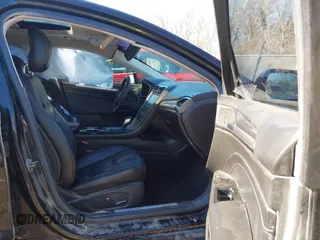 2013 Ford Fusion Titanium Hybrid with VIN 3FA6P0RU5DR339716, listed as a IAAI auction lot 41405835 with 197,840 mi miles. Bid and sale history available at carsss.com. Image 5.