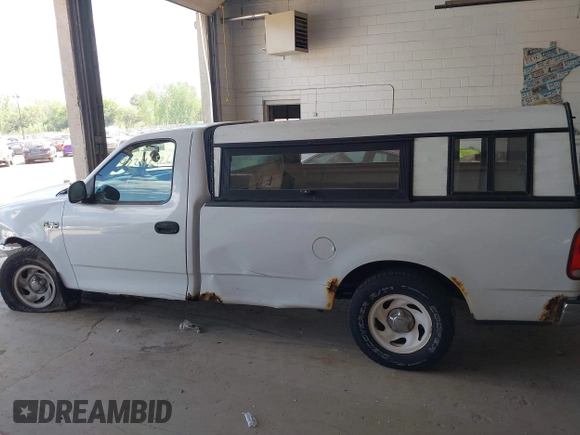 2004 Ford F-150 XL with VIN 2FTRF17214CA28696, listed as a IAAI auction lot 42246526 with 132,403 mi miles and . Bid and sale history available at DreamBid. Image 14.