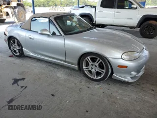 2004 Mazda MX-5 Miata LS z VIN JM1NB353X40404238, wystawiony jako Copart lot #61601895 z przebiegiem 110 549 mil mil oraz Szkoda całkowita • Salvage title. Historia ofert i sprzedaży dostępna na DreamBid. Obrazek 4.