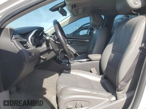 2018 Chevrolet Impala LT with VIN 2G1105S36J9152227, listed as a Copart auction lot 54673975 with 141,873 mi miles and Salvage Title. Bid and sale history available at DreamBid. Image 7.