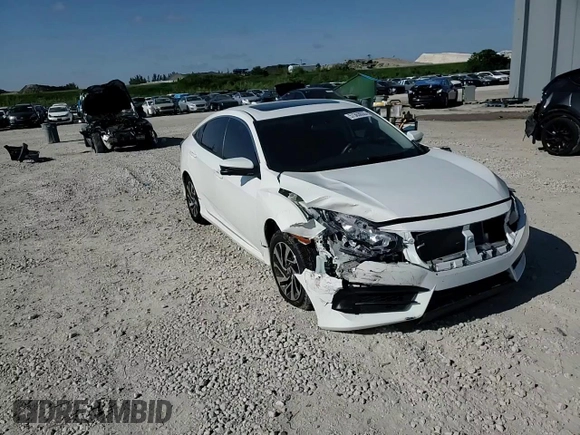 2018 Honda Civic EX с VIN 19XFC2F78JE037033, выставлен на аукционе Copart как лот 57363035 с пробегом 44 820 миль миль и Списание • Salvage title. История ставок и продаж доступна на DreamBid. Изображение 14.