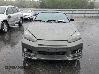2008 Hyundai Tiburon GS z VIN KMHHM66D18U264820, wystawiony jako Copart lot #54485415 z przebiegiem 158 129 mil mil oraz Szkody całkowita. Historia ofert i sprzedaży dostępna na DreamBid. Obrazek 5.