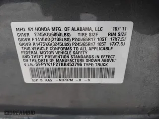 2011 Honda Ridgeline RT with VIN 5FPYK1F27BB453796, listed as a IAAI auction lot 41126251 with 122,746 mi miles. Bid and sale history available at carsss.com. Image 9.