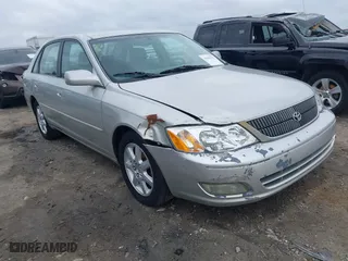 2002 Toyota Avalon XL with VIN 4T1BF28B82U240087, listed as a IAAI auction lot 41699355 with 263,253 mi miles. Bid and sale history available at carsss.com. Image 1.