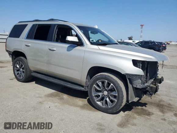 2016 Chevrolet Tahoe LS with VIN 1GNSCAKC7GR465949, listed as a Copart auction lot 50030625 with 136,608 mi miles and Salvage title. Bid and sale history available at DreamBid. Image 4.
