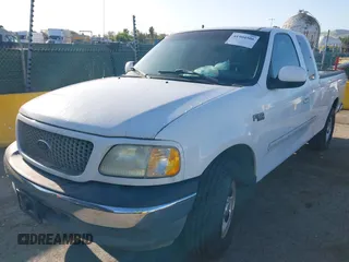 2002 Ford F-150 XL with VIN 1FTRX17292NB12320, listed as a IAAI auction lot 41904506 with 89,191 mi miles. Bid and sale history available at carsss.com. Image 2.