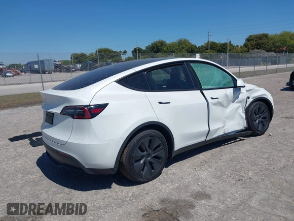 2025 Tesla Model Y Long Range with VIN 7SAYGDED6SF234278, listed as a IAAI auction lot 41781695 with 1,168 mi miles and . Bid and sale history available at DreamBid. Image 4.