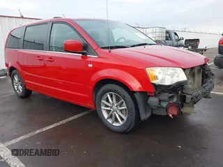 2014 Dodge Grand Caravan SXT with VIN 2C4RDGCG3ER257695, listed as a IAAI auction lot 41534568 with 116,896 mi miles and . Bid and sale history available at DreamBid. Image 1.