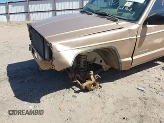 1999 Jeep Cherokee SE with VIN 1J4FF28S5XL520501, listed as a IAAI auction lot 41706800 with Not provided miles and . Bid and sale history available at DreamBid. Image 6.