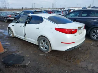 2015 Kia Optima LX with VIN KNAGM4A75F5644401, listed as a IAAI auction lot 41672679 with 217,636 mi miles. Bid and sale history available at carsss.com. Image 3.