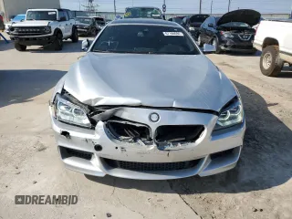 2013 BMW 6 Series 650i xDrive with VIN WBA6B4C59DD098525, listed as a Copart auction lot 67160694 with 52,413 mi miles and Salvage Title. Bid and sale history available at carsss.com. Image 5.