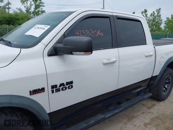 2016 Ram 1500 Rebel with VIN 1C6RR7YTXGS417801, listed as a IAAI auction lot 42382016 with 142,636 mi miles and . Bid and sale history available at DreamBid. Image 14.