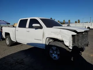 2017 Chevrolet Silverado 1500 LT with VIN 1GCPCREC8HF208746, listed as a Copart auction lot 87186244 with 94,643 mi miles and Salvage Title. Bid and sale history available at DreamBid. Image 4.