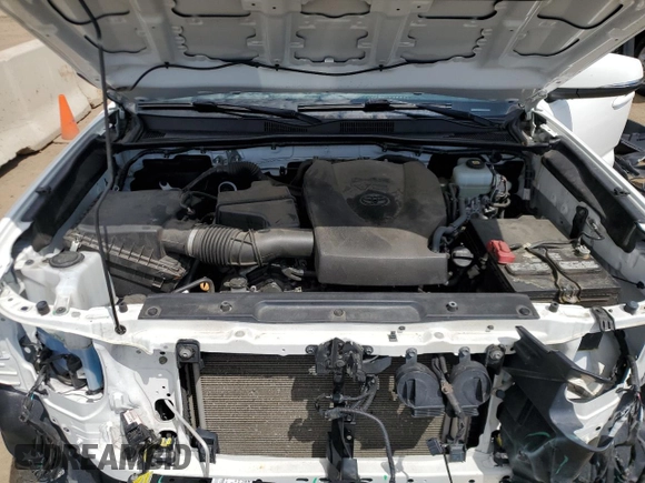 2022 Toyota Tacoma SR с VIN 3TMCZ5AN7NM454051, выставлен на аукционе Copart как лот 59896115 с пробегом 70 202 миль миль и Списание • Salvage title. История ставок и продаж доступна на DreamBid. Изображение 11.