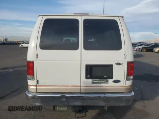 2000 Ford Econoline Passenger XL with VIN 1FBSS31L5YHA09064, listed as a Copart auction lot 84828844 with 257,973 mi miles and Salvage Title. Bid and sale history available at DreamBid. Image 6.