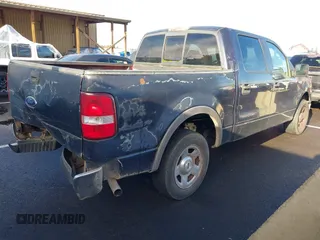2005 Ford F-150 XLT with VIN 1FTRW12W25KB58736, listed as a IAAI auction lot 41119113 with 218,797 mi miles. Bid and sale history available at carsss.com. Image 4.