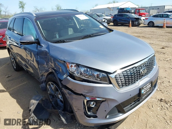 2020 Kia Sorento SX z VIN 5XYPKDA53LG646612, wystawiony jako IAAI lot #42108349 z przebiegiem 74 334 mil mil oraz . Historia ofert i sprzedaży dostępna na DreamBid. Obrazek 1.