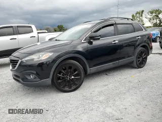 2015 Mazda CX-9 Grand Touring z VIN JM3TB2DA8F0457807, wystawiony jako Copart lot #61803555 z przebiegiem 110 104 mil mil oraz Czysty tytuł • Clean title. Historia ofert i sprzedaży dostępna na DreamBid. Obrazek 1.