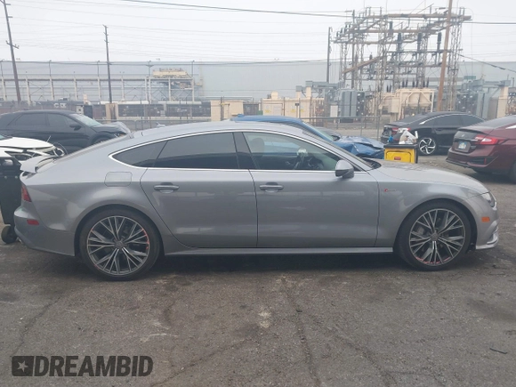 2016 Audi A7 3.0 Premium Plus with VIN WAUWGAFC0GN003357, listed as a IAAI auction lot 41468854 with 62,590 mi miles. Bid and sale history available at carsss.com. Image 13.