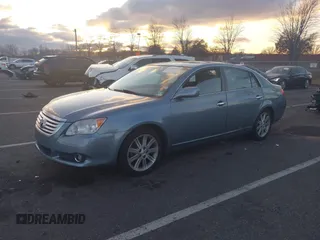 2010 Toyota Avalon XL with VIN 4T1BK3DB1AU363817, listed as a IAAI auction lot 41010053 with 259,106 mi miles and . Bid and sale history available at carsss.com. Image 19.
