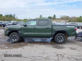 2021 Toyota Tacoma SR with VIN 3TMCZ5AN5MM380286, listed as a IAAI auction lot 42165523 with 58,965 mi miles and . Bid and sale history available at DreamBid. Image 14.