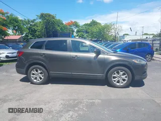 2015 Mazda CX-9 Touring z VIN JM3TB2CV1F0458995, wystawiony jako IAAI lot #42523344 z przebiegiem 130 763 mil mil oraz . Historia ofert i sprzedaży dostępna na DreamBid. Obrazek 13.