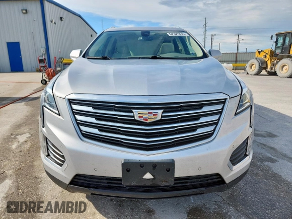 2017 Cadillac XT5 Luxury FWD z VIN 1GYKNBRS2HZ159582, wystawiony jako Copart lot #62429475 z przebiegiem 99 188 mil mil oraz Czysty tytuł • Clean title. Historia ofert i sprzedaży dostępna na DreamBid. Obrazek 5.