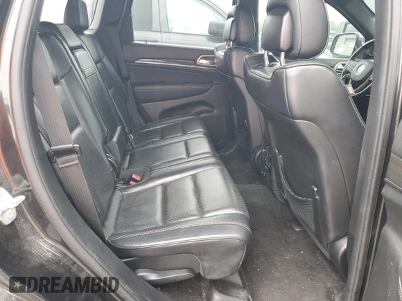 2015 Jeep Grand Cherokee Overland with VIN 1C4RJFCT2FC762573, listed as a Copart auction lot 59123275 with 229,128 mi miles and Salvage title. Bid and sale history available at DreamBid. Image 10.