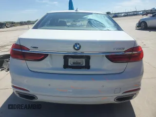 2018 BMW 7 Series 740i xDrive with VIN WBA7E4C52JGV24125, listed as a Copart auction lot 48164214 with 77,695 mi miles. Bid and sale history available at carsss.com. Image 6.