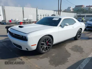 2019 Dodge Challenger GT z VIN 2C3CDZJG7KH503920, wystawiony jako IAAI lot #41604967 z przebiegiem 93 829 mil mil oraz . Historia ofert i sprzedaży dostępna na DreamBid. Obrazek 2.
