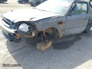 1996 Honda Civic DX with VIN 2HGEJ6344TH115500, listed as a IAAI auction lot 41783022 with 148,439 mi miles. Bid and sale history available at carsss.com. Image 6.