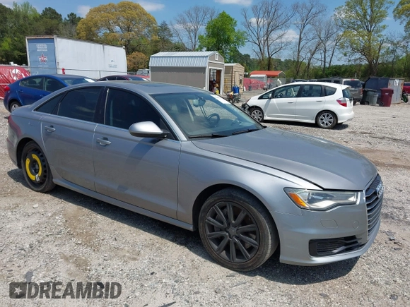 2016 Audi A6 Premium z VIN WAUCFAFC2GN111968, wystawiony jako IAAI lot #42003738 z przebiegiem 149 089 mil mil oraz . Historia ofert i sprzedaży dostępna na DreamBid. Obrazek 1.
