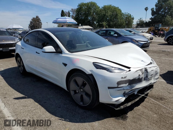 2023 Tesla Model 3 with VIN 5YJ3E1EA9PF401418, listed as a Copart auction lot 50597015 with 79,673 mi miles and Salvage Title. Bid and sale history available at DreamBid. Image 4.