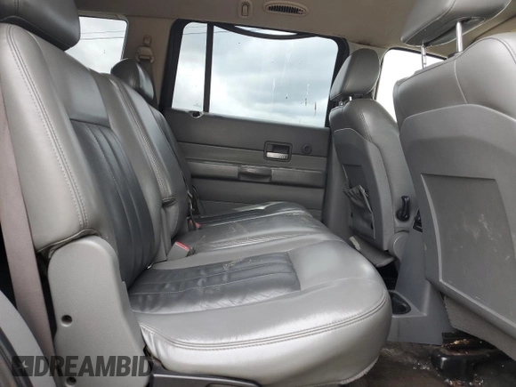 2004 Dodge Durango Limited z VIN 1D4HD58N54F217005, wystawiony jako Copart lot #56061125 z przebiegiem 185 114 mil mil oraz Szkoda całkowita • Salvage title. Historia ofert i sprzedaży dostępna na DreamBid. Obrazek 11.