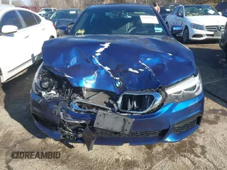 2017 BMW 5 Series 530i xDrive with VIN WBAJA7C32HG907106, listed as a IAAI auction lot 41020855 with 70,650 mi miles and . Bid and sale history available at carsss.com. Image 12.