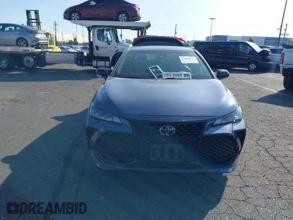 2019 Toyota Avalon XLE z VIN 4T1BZ1FB5KU030812, wystawiony jako IAAI lot #41498998 z przebiegiem 31 986 mil mil oraz . Historia ofert i sprzedaży dostępna na DreamBid. Obrazek 13.