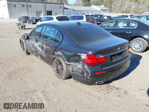 2015 BMW 7 Series 750Li xDrive with VIN WBAYF8C56FD654698, listed as a IAAI auction lot 41229313 with 120,238 mi miles and . Bid and sale history available at carsss.com. Image 3.