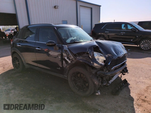 2012 MINI Countryman S with VIN WMWZC5C50CWL63321, listed as a Copart auction lot 52427065 with 126,898 mi miles and Salvage Title. Bid and sale history available at DreamBid. Image 4.
