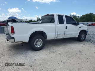2003 Ford F-250 XL with VIN 1FTNX20L63EB37975, listed as a Copart auction lot 65723935 with 157,377 mi miles and Salvage title. Bid and sale history available at DreamBid. Image 3.