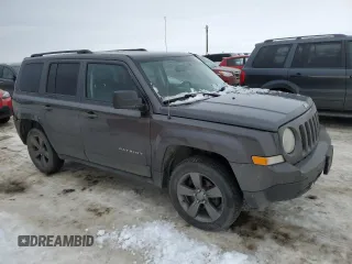 2015 Jeep Patriot North with VIN 1C4NJRAB7FD311725, listed as a Copart auction lot 82647074 with 185,560 mi miles and Salvage Title. Bid and sale history available at carsss.com. Image 4.