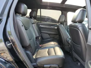 2020 Cadillac XT6 FWD Premium Luxury с VIN 1GYKPCRSXLZ174002, выставлен на аукционе Copart как лот 52083235 с пробегом 79 712 миль миль и Списание • Salvage title. История ставок и продаж доступна на DreamBid. Изображение 11.
