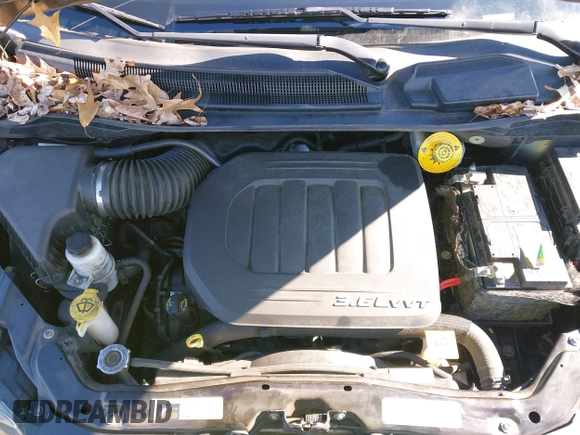 2016 Dodge Grand Caravan SE with VIN 2C4RDGBG8GR335456, listed as a IAAI auction lot 41537809 with 125,081 mi miles and . Bid and sale history available at DreamBid. Image 10.