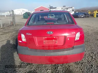 2009 Kia Rio LX with VIN KNADE223796485606, listed as a IAAI auction lot 41676881 with 58,852 mi miles and . Bid and sale history available at DreamBid. Image 16.