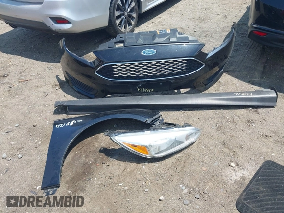 2016 Ford Focus SE with VIN 1FADP3F29GL256160, listed as a IAAI auction lot 42188124 with 72,868 mi miles and . Bid and sale history available at DreamBid. Image 12.