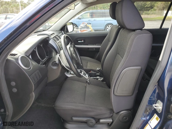 2012 Suzuki Grand Vitara Premium with VIN JS3TD0D6XC4100380, listed as a Copart auction lot 79930594 with 132,712 mi miles and Salvage Title. Bid and sale history available at carsss.com. Image 7.