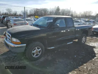 2002 Dodge Dakota z VIN 1B7GG42X52S573625, wystawiony jako Copart lot #87913795 z przebiegiem 94 316 mil mil oraz Szkoda całkowita • Salvage title. Historia ofert i sprzedaży dostępna na DreamBid. Obrazek 1.